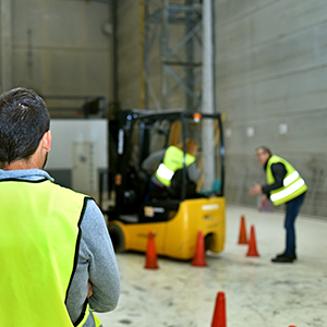 Man watching health and safety inspection in warehouse