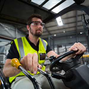 Man driving forklift truck as part of Thorough Examination