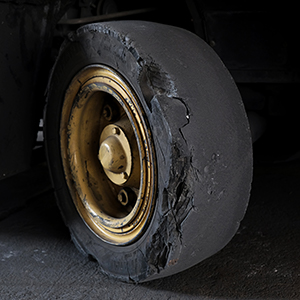 Worn forklift tyre